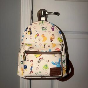 Loungefly discontinued Pixar character mini backpack.